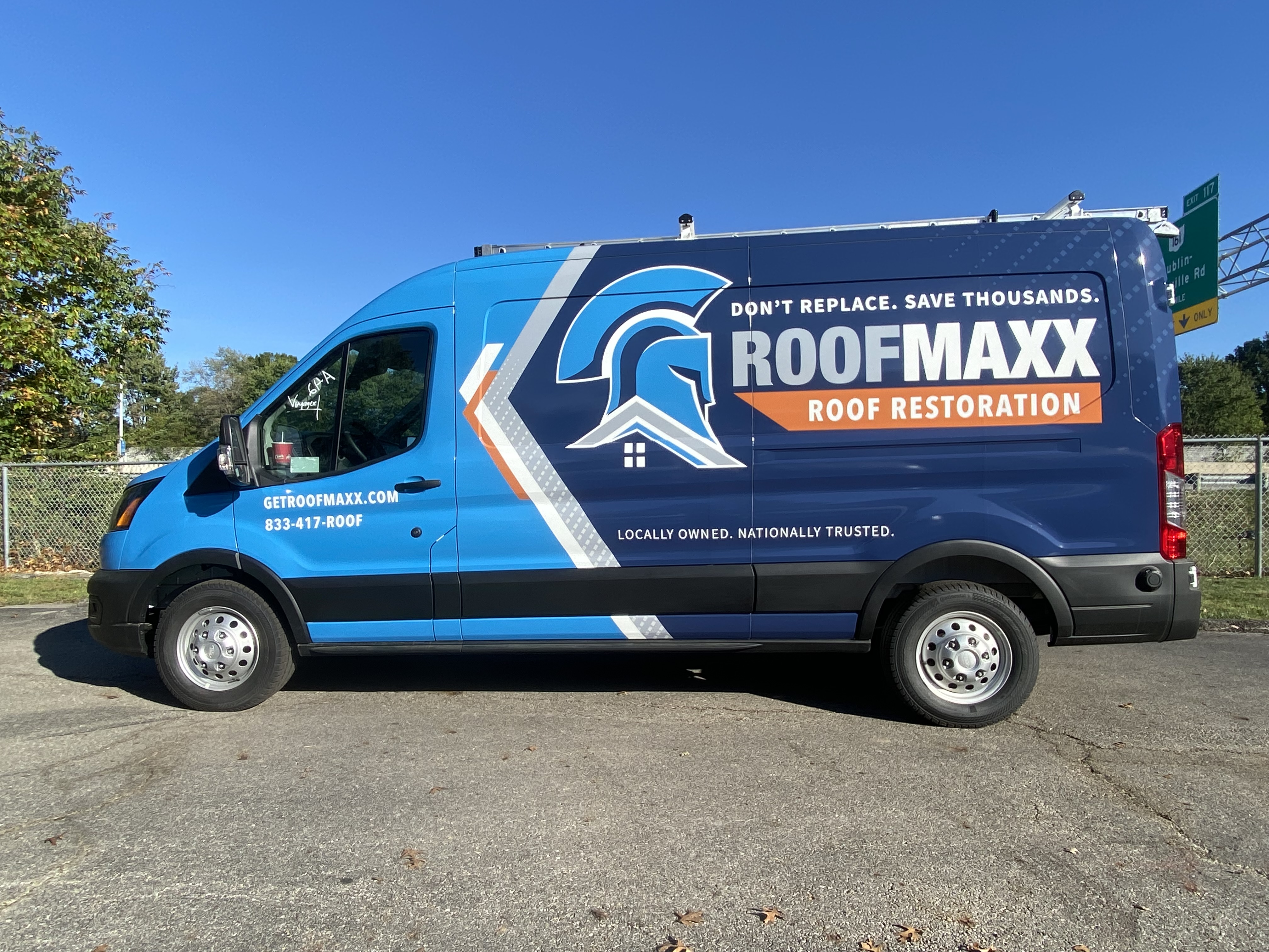 Roof Maxx branded service van